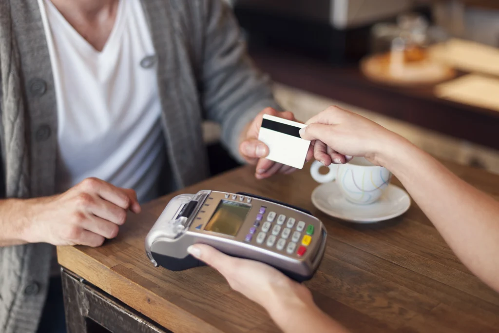 close-up-customer-paying-by-credit-card