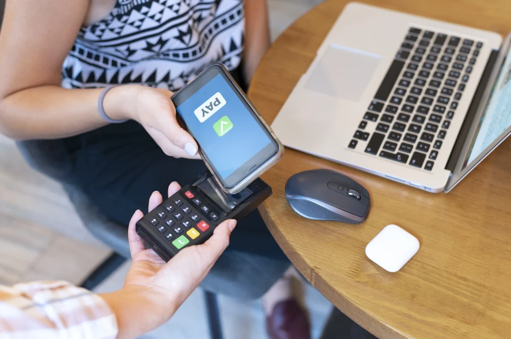 person-paying-with-its-smartphone-wallet-app