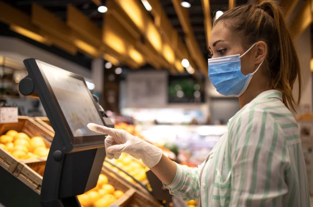 Retail cashier using POS inventory management system