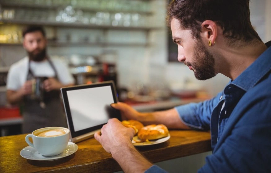 Restaurant staff using modern POS system efficiently