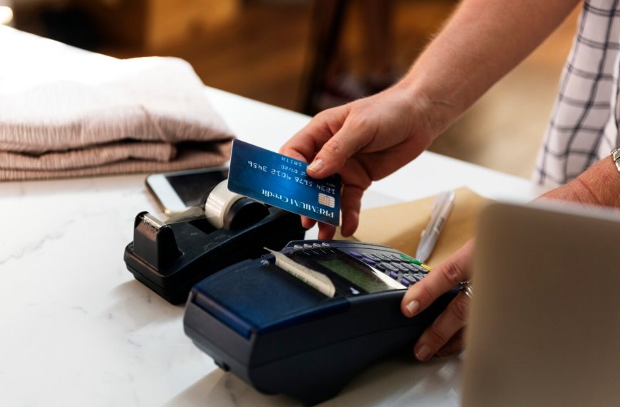 Customer processing credit card payment through terminal