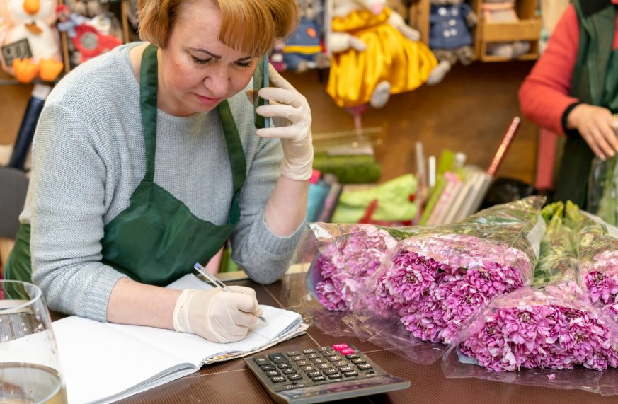 Business owner managing merchant account transactions daily
