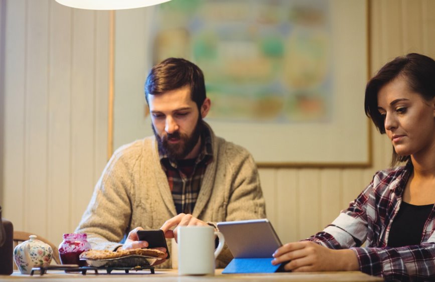 Business partners reviewing merchant account payment details