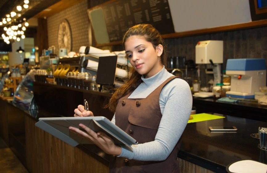 Restaurant staff using top rated POS system